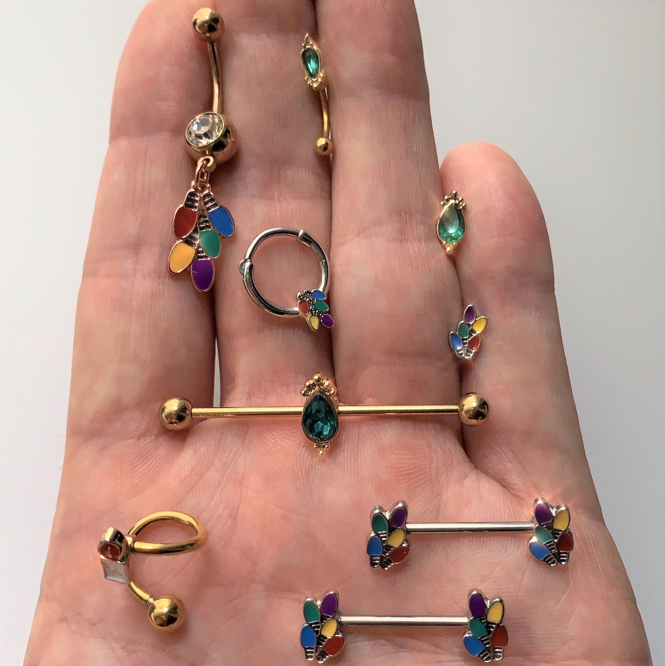16G 5/16 Green Gem Gold Tone Regal Drop Curved Eyebrow Ring